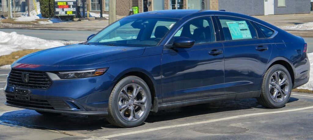 Current-generation (11th-generation) Honda Accord sedan, front three-quarter view in blue